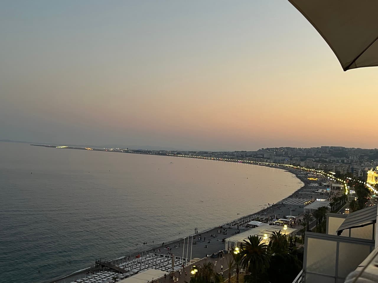 The Promenade des Anglais in Nice, France, with the turquoise Baie des Anges